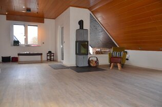 Wohnzimmer mit Kaminofen