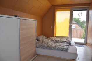 Schlafzimmer 2. OG mit Loggia