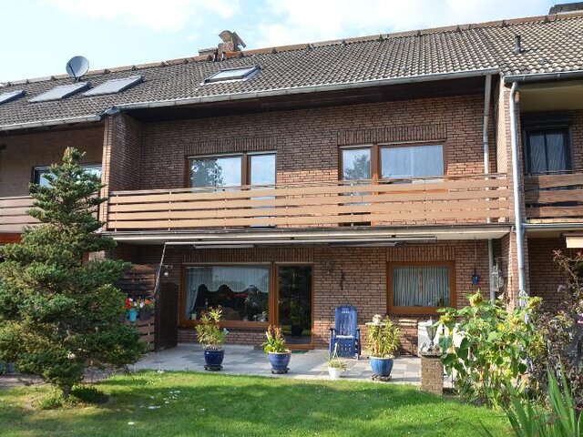 Rückseite mit Terrasse+Loggien