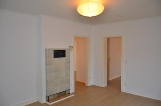 Wohnzimmer mit Deko-Ofen